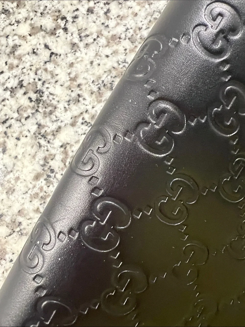 Gucci Black Embossed GG Crossbody Bag with Bow Accent